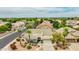 Aerial view of home with mature landscaping, and proximity to community park in a desirable neighborhood at 10760 W Encanto Blvd, Avondale, AZ 85392
