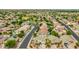 Wide aerial view showcases home's location and many other homes in this community at 10760 W Encanto Blvd, Avondale, AZ 85392