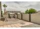 Backyard patio with pergola, decorative brick and rock features, perfect for enjoying the outdoors at 10760 W Encanto Blvd, Avondale, AZ 85392