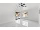 Bright, airy bedroom featuring vaulted ceilings, marble floors, and backyard pool access at 10760 W Encanto Blvd, Avondale, AZ 85392