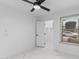 Bright bedroom with marble floors, ceiling fan, walk-in closet and natural light at 10760 W Encanto Blvd, Avondale, AZ 85392