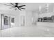 Bright living room with marble floors and a view of the kitchen, perfect for modern living at 10760 W Encanto Blvd, Avondale, AZ 85392