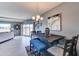 Dining area with a stylish table and chandelier at 11069 E Kilarea Ave # 194, Mesa, AZ 85209