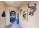 Inviting front entry featuring colorful Southwestern decor at 11069 E Kilarea Ave # 194, Mesa, AZ 85209