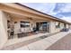 Charming covered patio with comfortable seating, ideal for outdoor relaxation and entertainment at 11069 E Kilarea Ave # 194, Mesa, AZ 85209