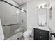 Modern bathroom featuring a glass-enclosed shower, vanity with marble countertop, and stylish fixtures at 11446 E Sweetwater Ave, Scottsdale, AZ 85259