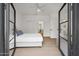 Bedroom with hardwood floors and closet at 11446 E Sweetwater Ave, Scottsdale, AZ 85259