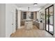 Spacious kitchen featuring a marble island, modern appliances, and a clean design at 11446 E Sweetwater Ave, Scottsdale, AZ 85259