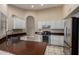 Modern kitchen featuring granite countertops, stainless steel appliances, and ample cabinet space at 13015 W Blue Sky Dr, Sun City West, AZ 85375