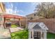 This lovely backyard has turf, a playhouse, a grill, and gazebo at 13540 N 87Th Dr, Peoria, AZ 85381