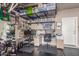 The garage features a dedicated office space and storage racks at 13540 N 87Th Dr, Peoria, AZ 85381
