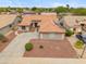 Aerial view of home showcasing desert landscaping, tile roof and solar panels at 14417 N 151St Dr, Surprise, AZ 85379