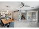 Open concept dining area next to kitchen with stainless steel appliances and easy access to a sliding glass door at 14417 N 151St Dr, Surprise, AZ 85379