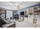 The living room offers a spacious layout, natural lighting, and a ceiling fan at 14417 N 151St Dr, Surprise, AZ 85379