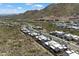 Aerial view of a neighborhood nestled in the mountains with winding roads at 14551 N Adero Canyon Dr, Fountain Hills, AZ 85268