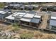 Aerial view showcasing back of house with patio, landscaping, and neighborhood at 14551 N Adero Canyon Dr, Fountain Hills, AZ 85268