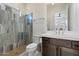 This bathroom features a tiled walk-in shower, modern vanity, and fixtures at 14551 N Adero Canyon Dr, Fountain Hills, AZ 85268