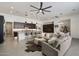 Open-concept living space with kitchen, dining area, and living room creating a seamless flow at 14551 N Adero Canyon Dr, Fountain Hills, AZ 85268