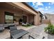 This outdoor living space features comfortable seating, a grill and a view at 14551 N Adero Canyon Dr, Fountain Hills, AZ 85268