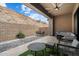 This covered outdoor living space offers a serene view and comfortable seating at 14551 N Adero Canyon Dr, Fountain Hills, AZ 85268