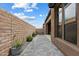 This sideyard features pavers, privacy walls, and minimal landscaping at 14551 N Adero Canyon Dr, Fountain Hills, AZ 85268