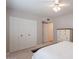 Bedroom boasts a ceiling fan and a large closet for storage at 14627 N 55Th Pl, Scottsdale, AZ 85254