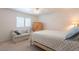 Light and bright bedroom with neutral carpeting and large shuttered windows at 14627 N 55Th Pl, Scottsdale, AZ 85254