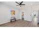 Bright bedroom with wood flooring features walk-in closet at 1642 E Monte Vista Rd # 5, Phoenix, AZ 85006