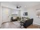Bright living room with two sofas, a view into the front door, and kitchen at 1642 E Monte Vista Rd # 5, Phoenix, AZ 85006