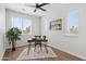 Bright office space featuring a modern desk, a comfortable chair, ample natural light, and stylish decor at 1642 E Monte Vista Rd # 5, Phoenix, AZ 85006
