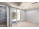 Bedroom with sliding glass doors leading to a private patio at 19601 N 7Th N St # 1072, Phoenix, AZ 85024