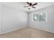 Bedroom featuring neutral paint, tile floors, and bright natural light at 19601 N 7Th N St # 1072, Phoenix, AZ 85024