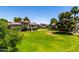 Well-maintained community green space featuring mature landscaping and inviting residential buildings at 19601 N 7Th N St # 1072, Phoenix, AZ 85024