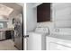Conveniently located laundry room near stainless kitchen appliances at 19601 N 7Th N St # 1072, Phoenix, AZ 85024