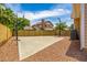 Enjoy this backyard's sport court for recreation and fun with Gathering and friends on a sunny day at 198 N Pecan Ct, Gilbert, AZ 85234