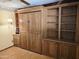 Bedroom with built in bookshelf, drawers and murphy bed at 2027 N 81St St, Scottsdale, AZ 85257