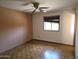 View of the bedroom with hard wood floors and a window at 2027 N 81St St, Scottsdale, AZ 85257