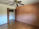 Bedroom featuring parquet floors and closet at 2027 N 81St St, Scottsdale, AZ 85257