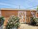 Backyard shed with yard equipment and bushes out front at 2027 N 81St St, Scottsdale, AZ 85257