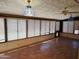 Bright sun room featuring tile flooring, many windows and vintage lighting at 2027 N 81St St, Scottsdale, AZ 85257
