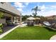 Wonderful backyard features a lush lawn, a hammock, patio and a sparkling pool at 2105 E San Carlos Pl, Chandler, AZ 85249