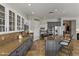 Chic kitchen with custom cabinetry, a spacious island with seating, and modern stainless steel appliances at 2105 E San Carlos Pl, Chandler, AZ 85249