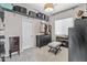 This spacious walk-in closet is equipped with shelving and hanging rods, offering ample storage and organization at 2105 E San Carlos Pl, Chandler, AZ 85249
