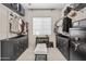 The walk-in closet has built-in shelving and drawers for optimal organization, enhancing both functionality and style at 2105 E San Carlos Pl, Chandler, AZ 85249