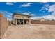 Expansive backyard with block fencing, patio, providing privacy and space for outdoor enjoyment at 21610 N Bradford Dr, Maricopa, AZ 85138