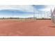 Baseball field with manicured playing surface and backstop, set within a well-maintained community sports complex at 21610 N Bradford Dr, Maricopa, AZ 85138