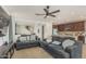 Cozy living room seamlessly connects to the kitchen, perfect for entertaining at 21610 N Bradford Dr, Maricopa, AZ 85138
