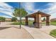 A park gazebo and grassy area offers space for relaxing at 21610 N Bradford Dr, Maricopa, AZ 85138
