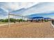 Well-equipped community playground with swings, slides, and climbing structures for outdoor recreation and enjoyment at 21610 N Bradford Dr, Maricopa, AZ 85138