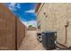 The side yard features an air conditioning unit at 21610 N Bradford Dr, Maricopa, AZ 85138